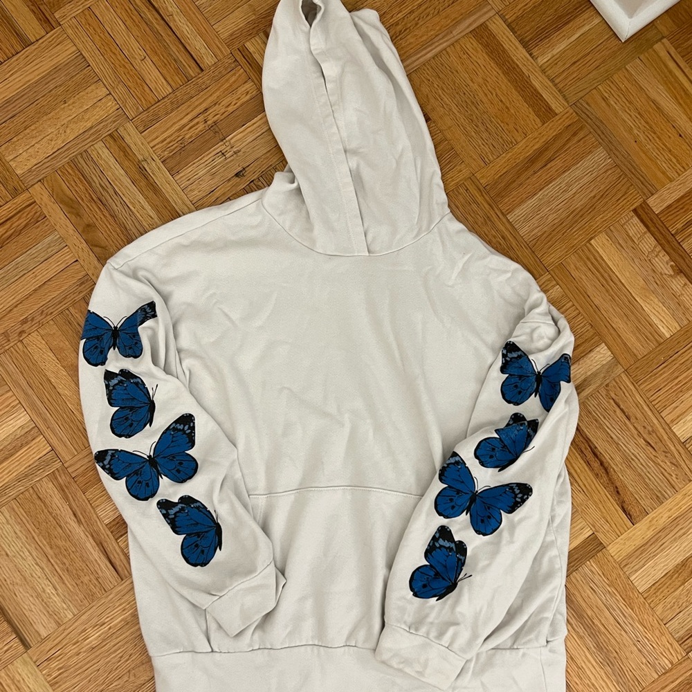 White thin cotton blue butterfly sweatshirt from Revolve